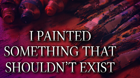 A table of old brushes and tubes of paint.